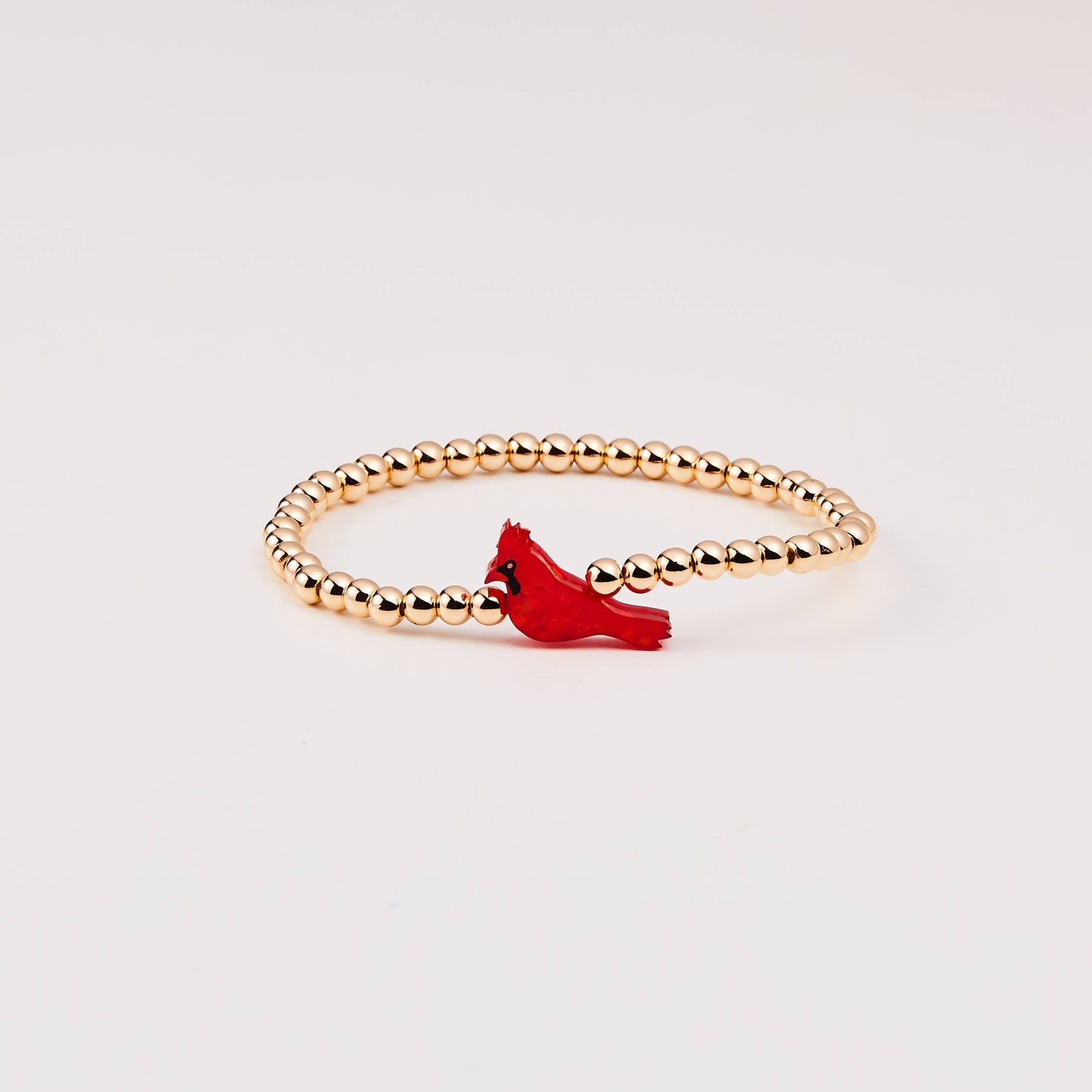 HOLY WATER RED CARDINAL BRACELET IN GOLD