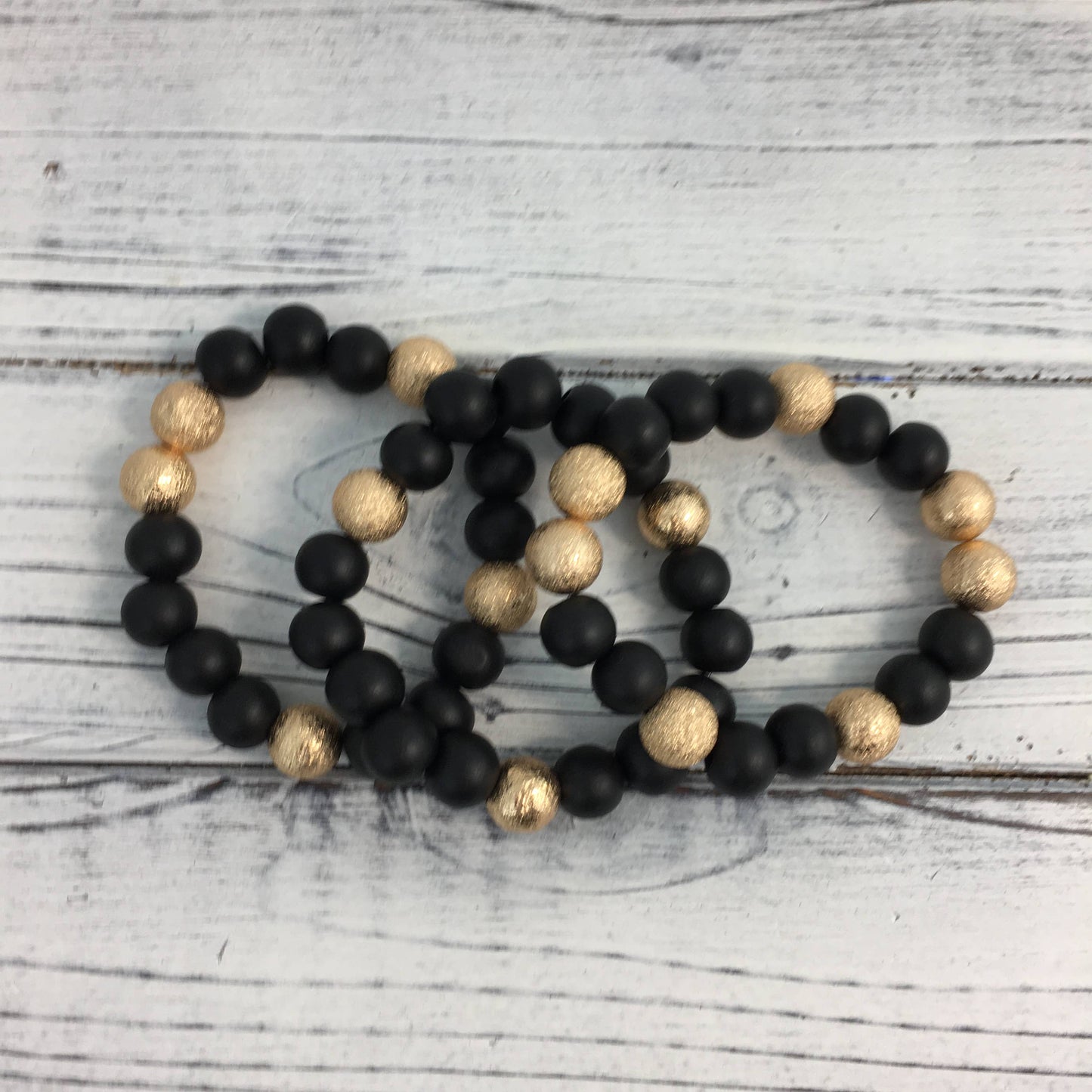 Black and gold ball stretch bracelet set 