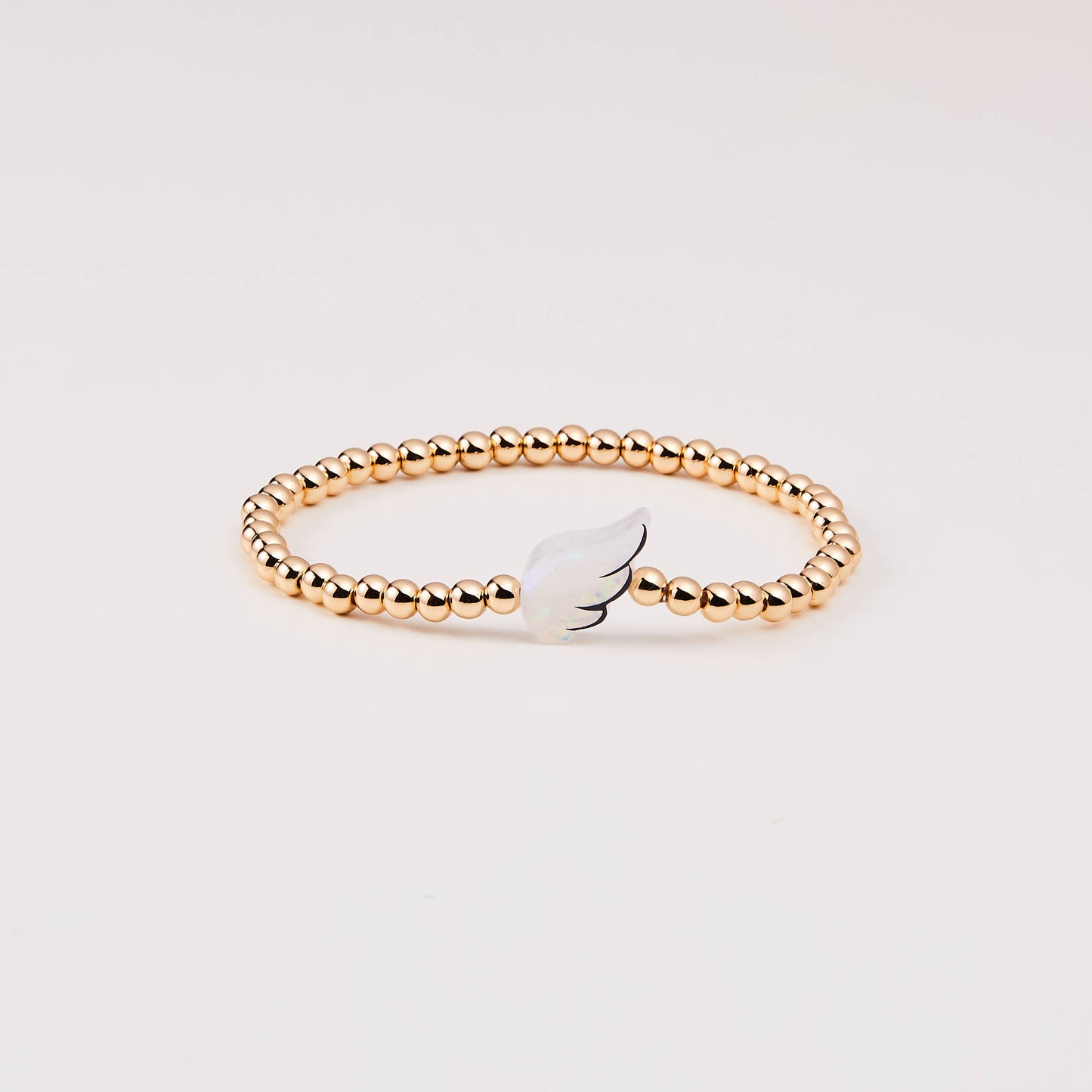 HOLY WATER ANGEL WING BRACELET IN GOLD