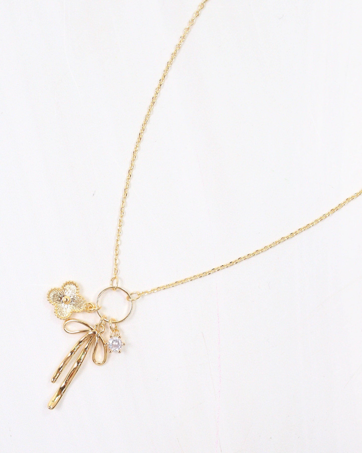 Brandon Bow Charm Necklace Gold